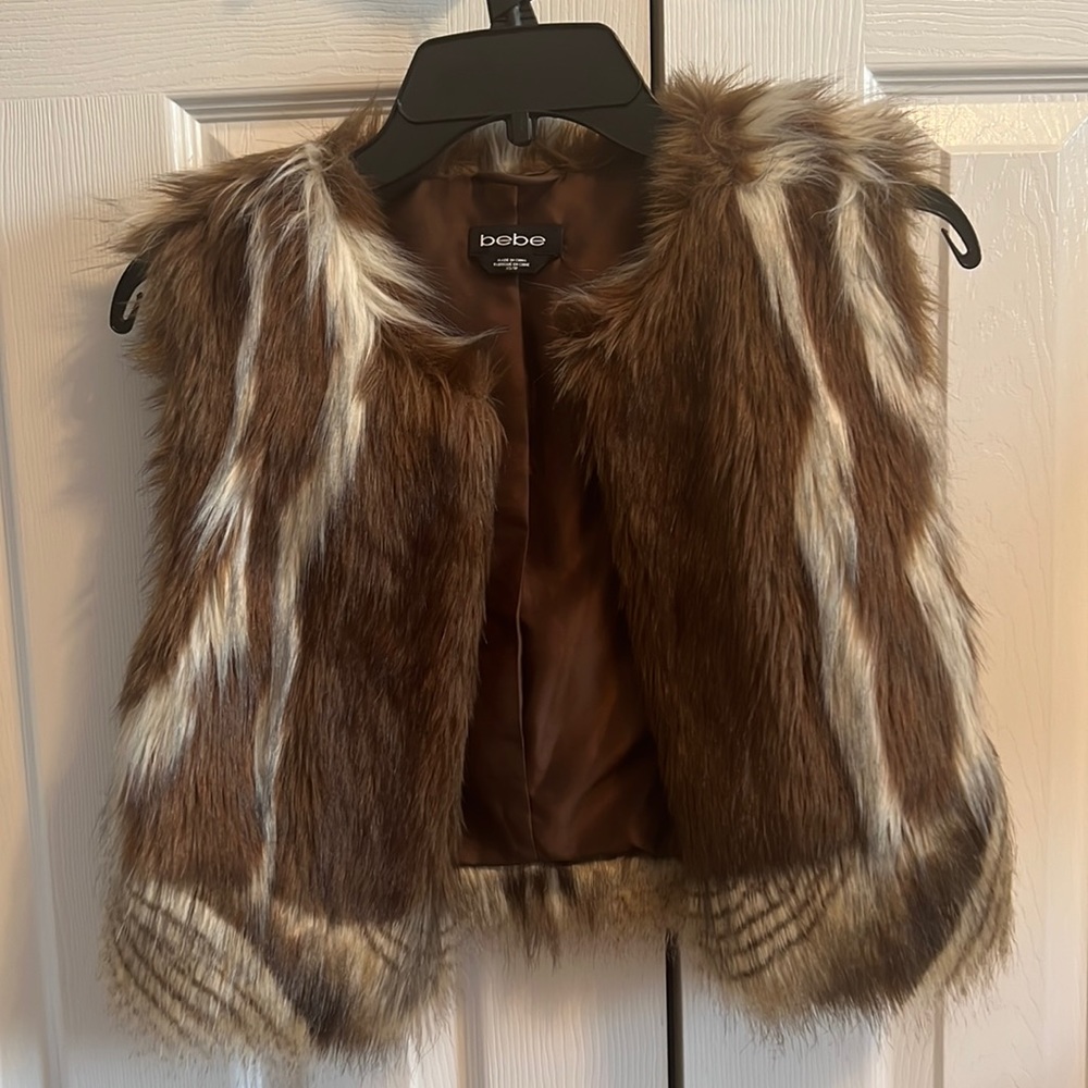 Never worn Bebe vest